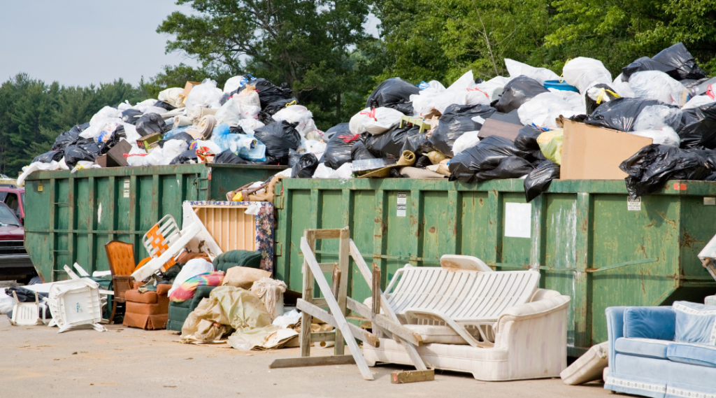 a container dumpster full of garbage