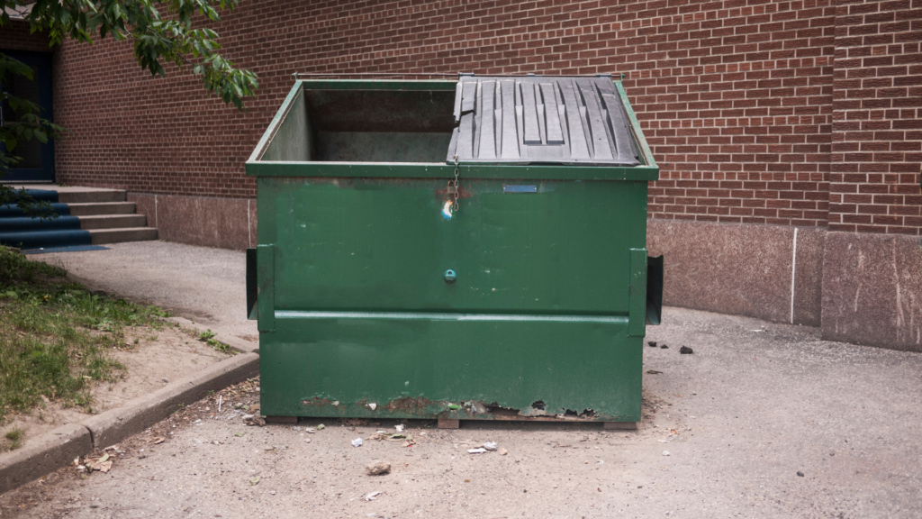 a green dumpster